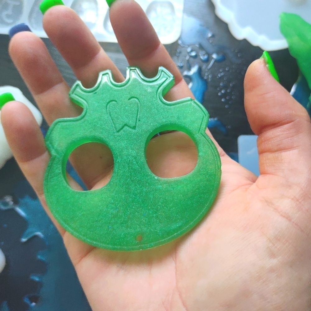 Green speckled self protection skull